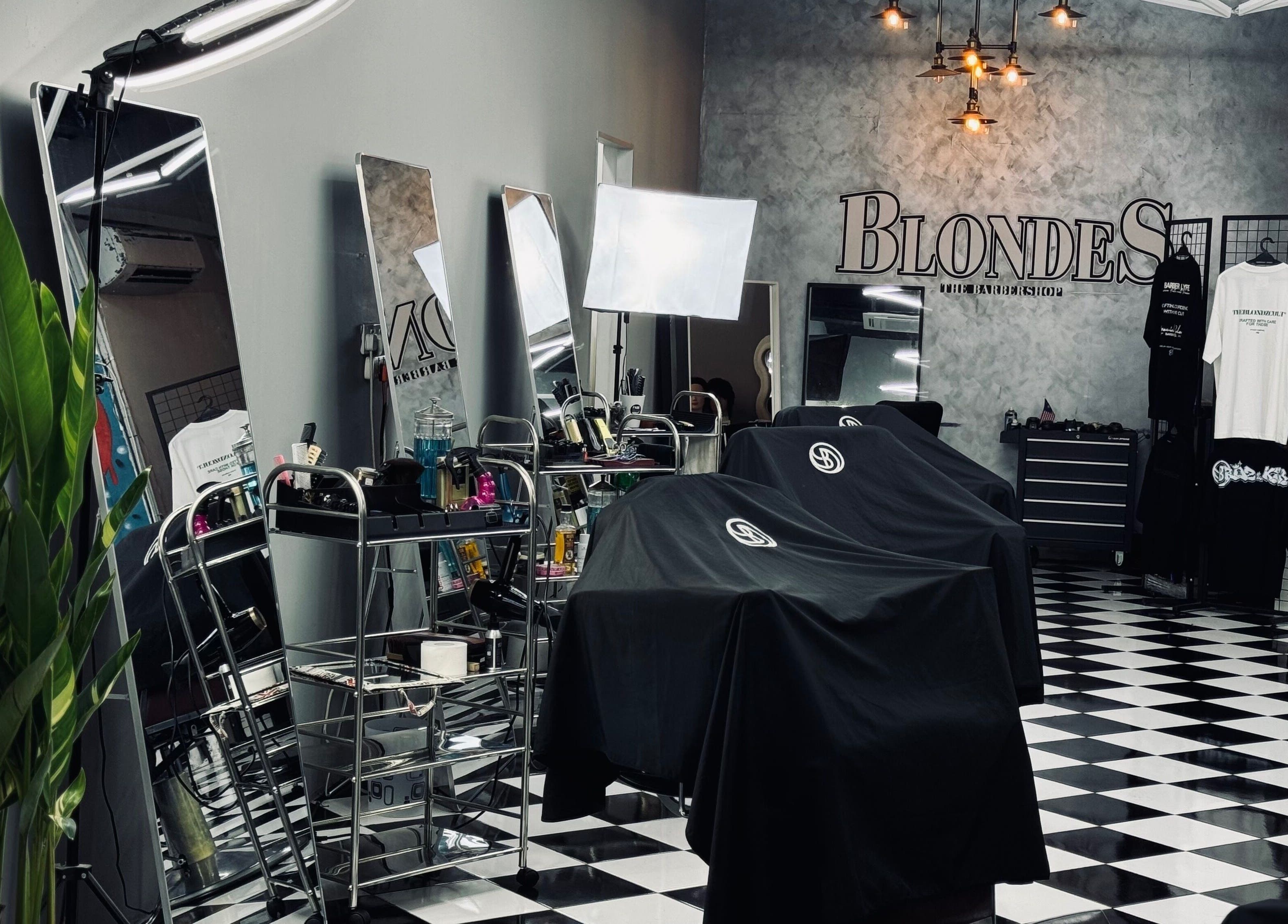 Modern interior of Blondz Barbershop in Petaling Jaya, Selangor, MY featuring sleek barber stations.