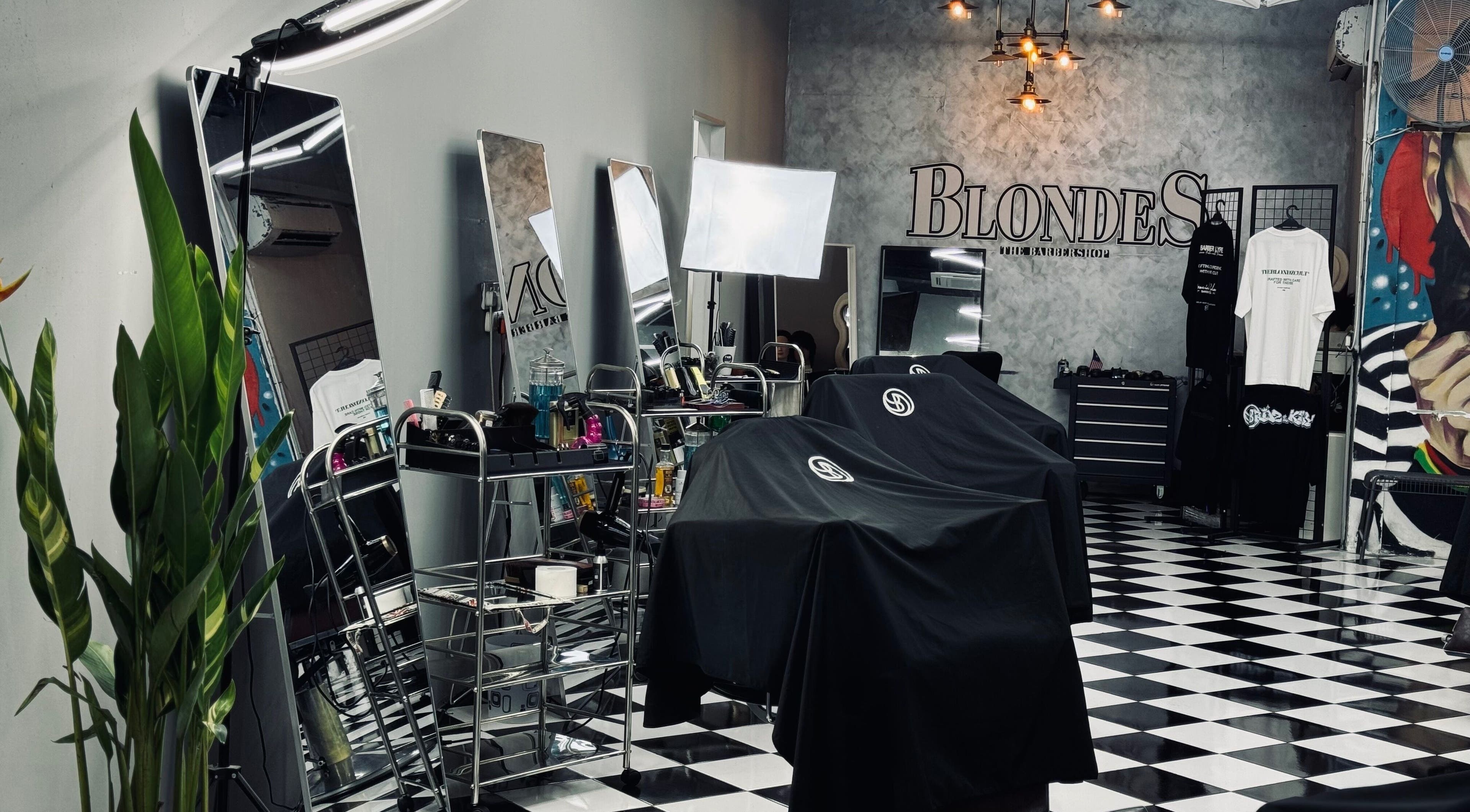 Modern interior of Blondz Barbershop in Petaling Jaya, Selangor, MY featuring sleek barber stations.