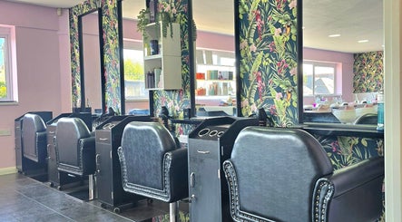 Elegant salon chairs at Perfectly Polished Plymstock, Plymouth, England. Stylish and vibrant decor.