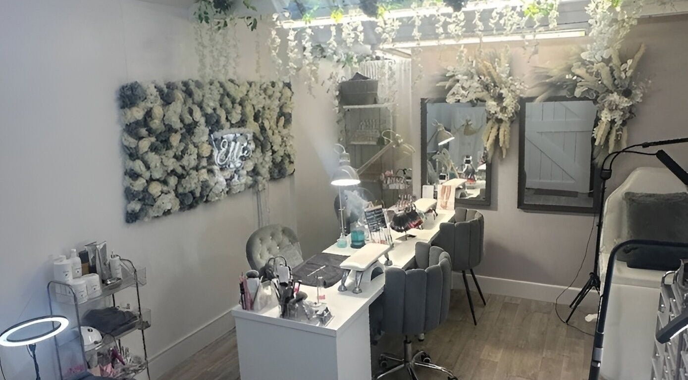 Chic interior of Beauty By Ellie, Boughton Monchelsea, England, features stylish decor and plush seating.