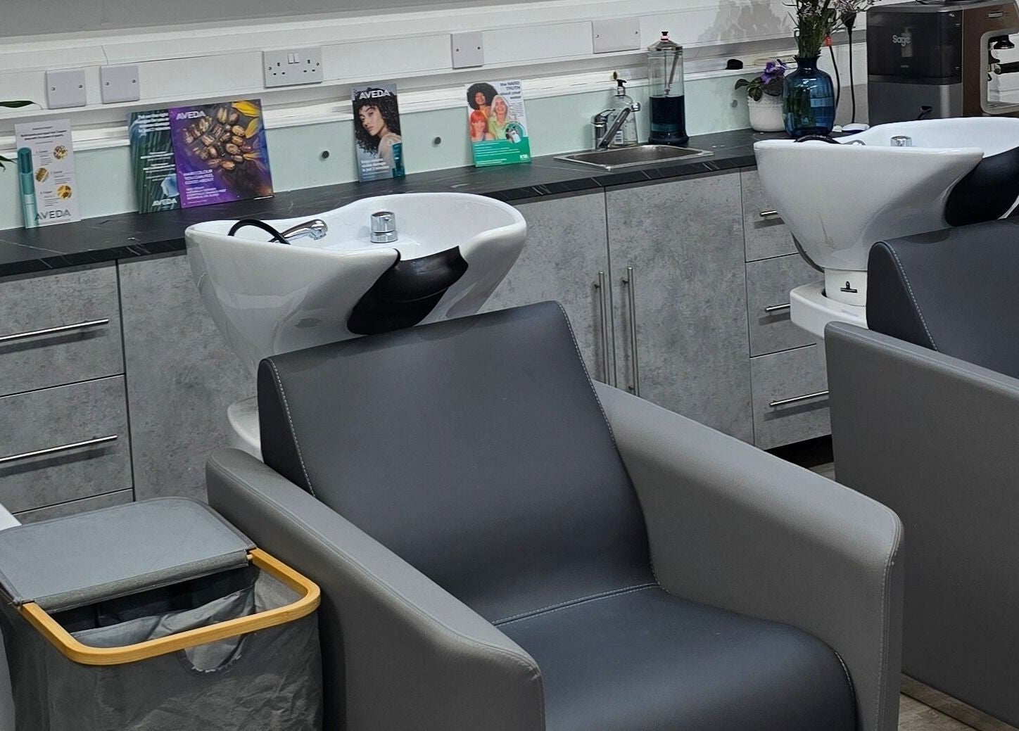 Modern wash stations at Happy Hair - UK in Abbots Langley, England, GB offering premium salon services.