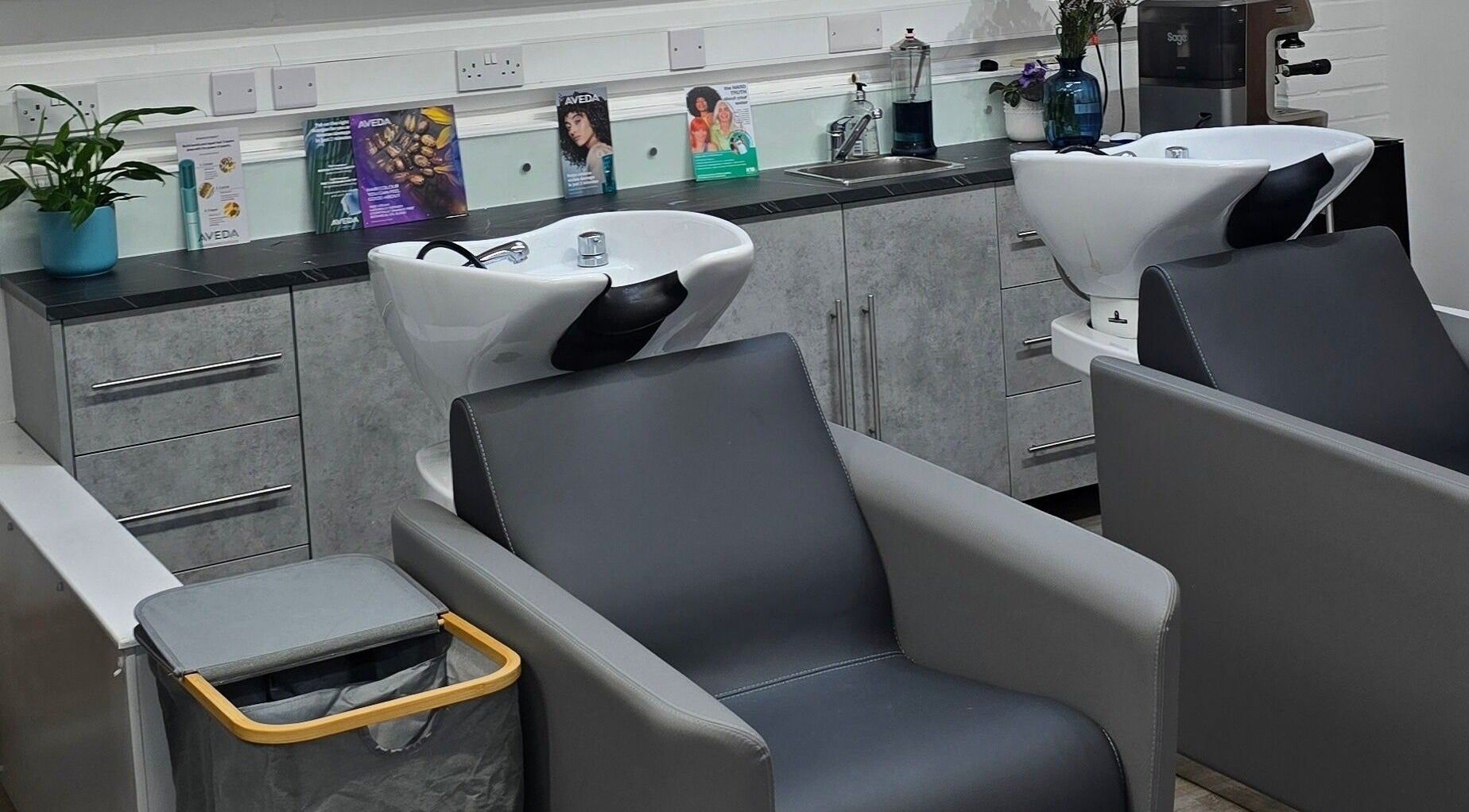 Modern wash stations at Happy Hair - UK in Abbots Langley, England, GB offering premium salon services.