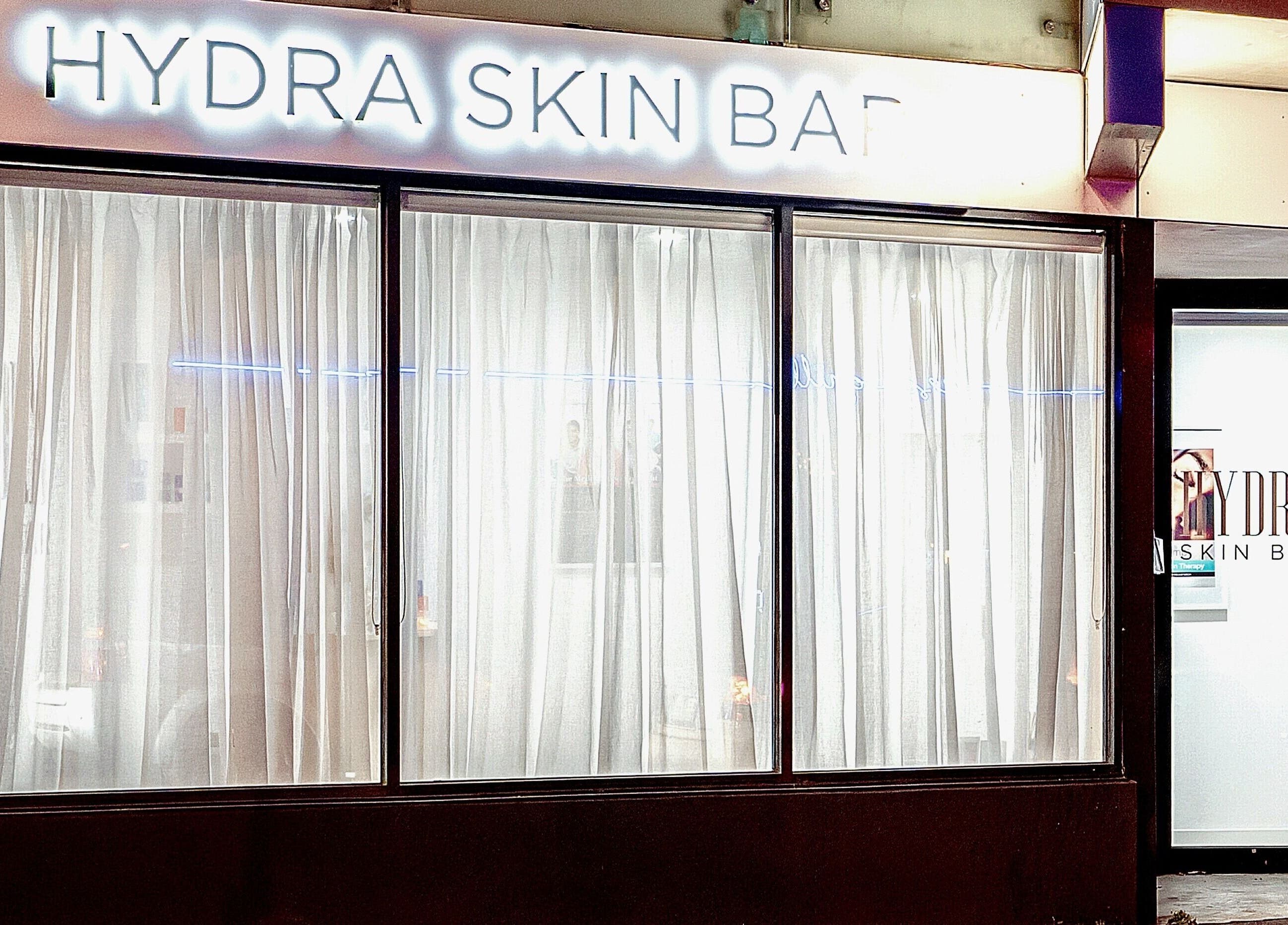 Front view of Hydra Skin Bar, Melbourne, Victoria, AU showcasing elegant windows and inviting entrance.