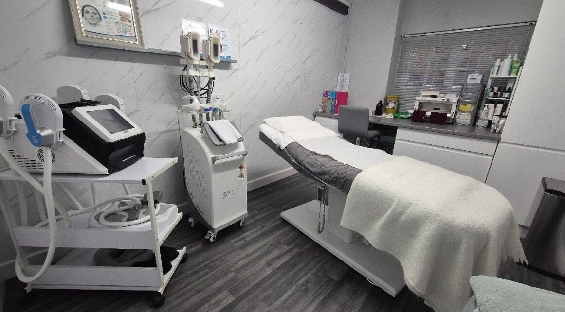 Treatment room at Evesham Aesthetics Clinic Limited, Evesham, England, GB, featuring modern equipment and cozy setup.