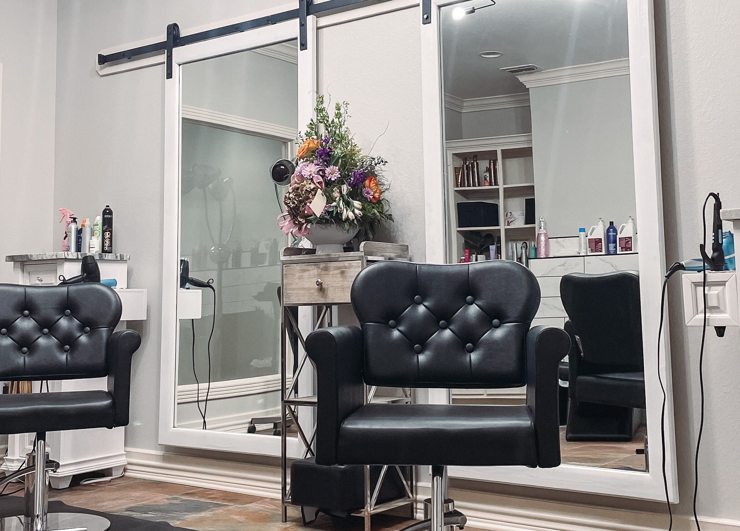 Elegant styling chairs at AMberly @Studio213, Jacksonville, Texas, US, perfect for beauty treatments.