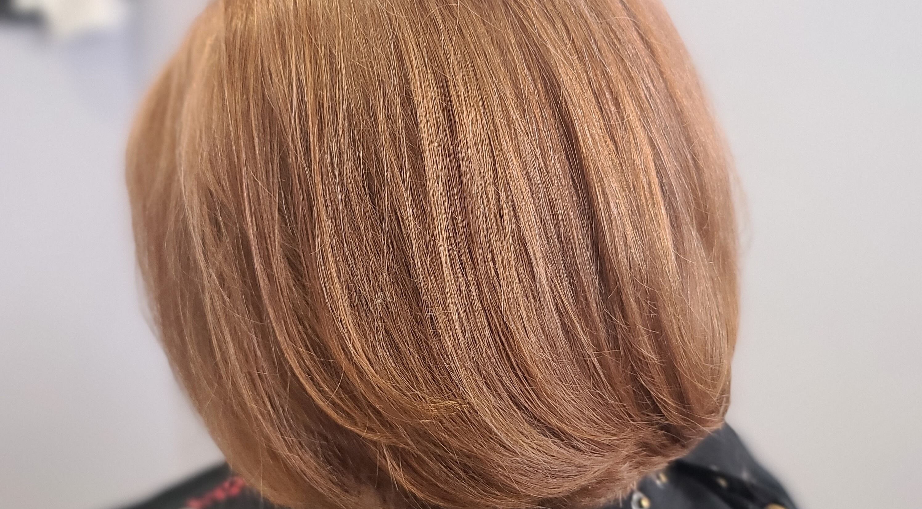 Stylish bob hairstyle at Taboo Salon in Telford, Pennsylvania, US. Perfectly trimmed and colored.