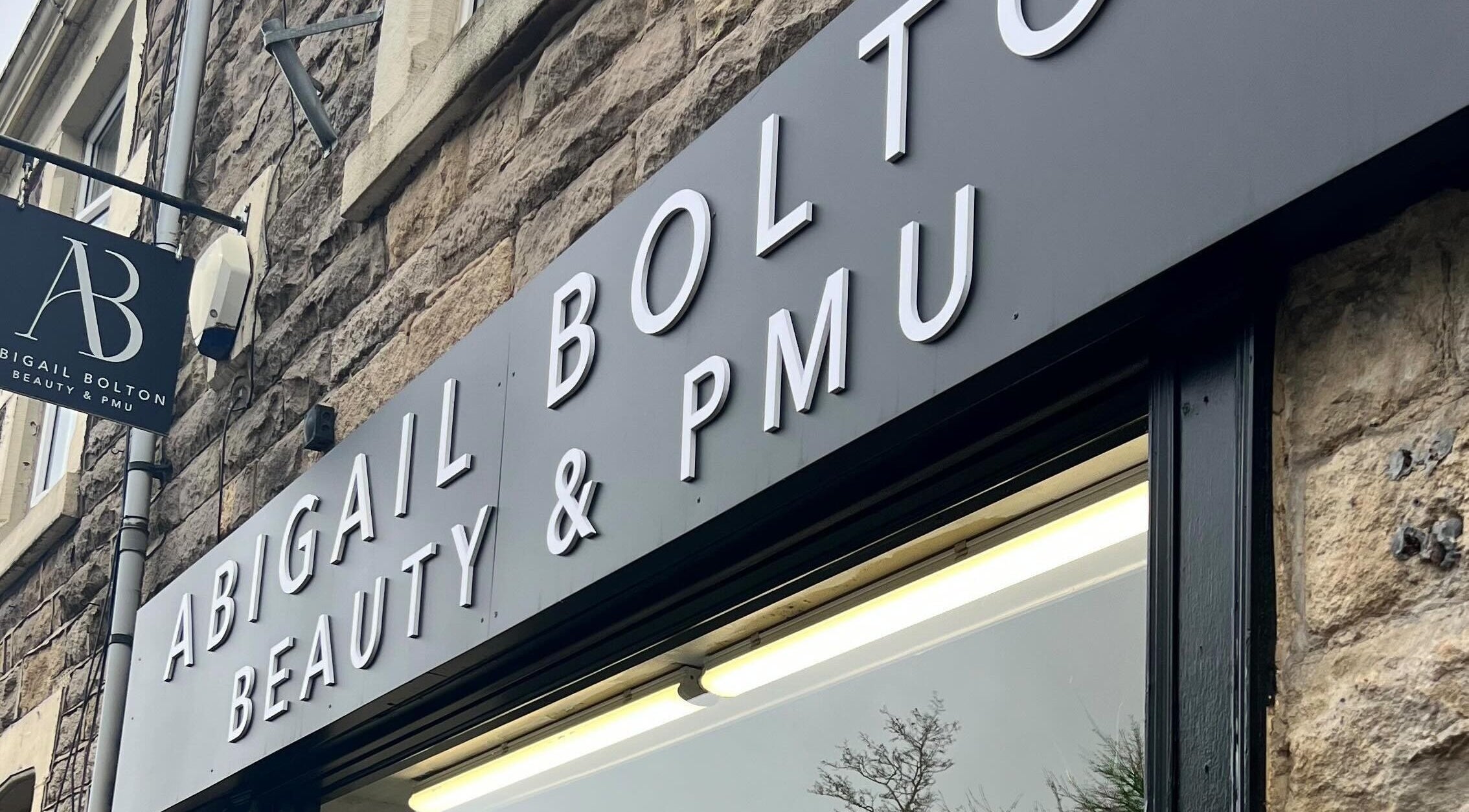 Exterior signage of Abigail Bolton - Beauty & PMU in Darwen, England, GB, showcasing modern designs.