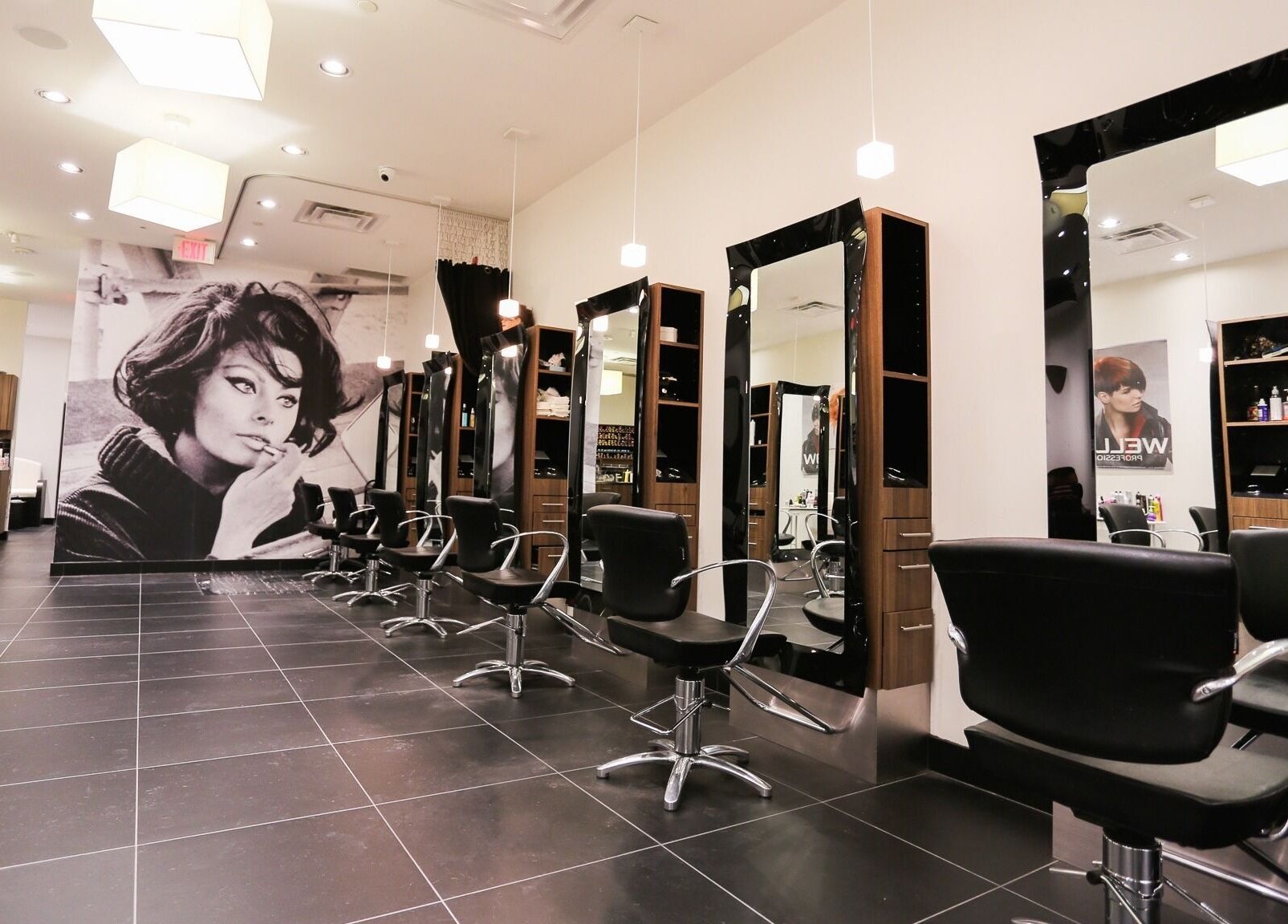 Modern salon at Joseph's Coiffures with sleek chairs in Ottawa, Ontario, CA.