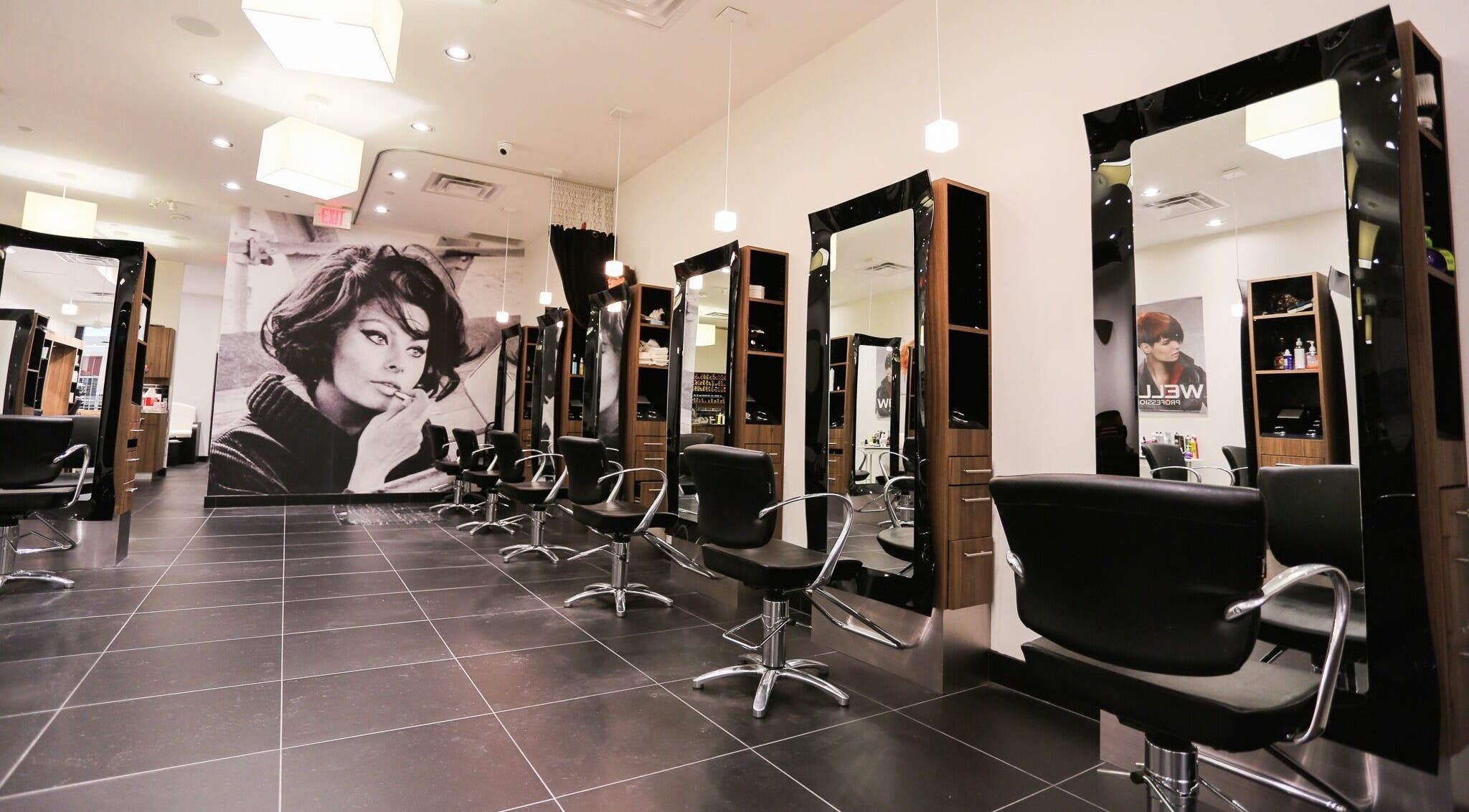 Modern salon at Joseph's Coiffures with sleek chairs in Ottawa, Ontario, CA.