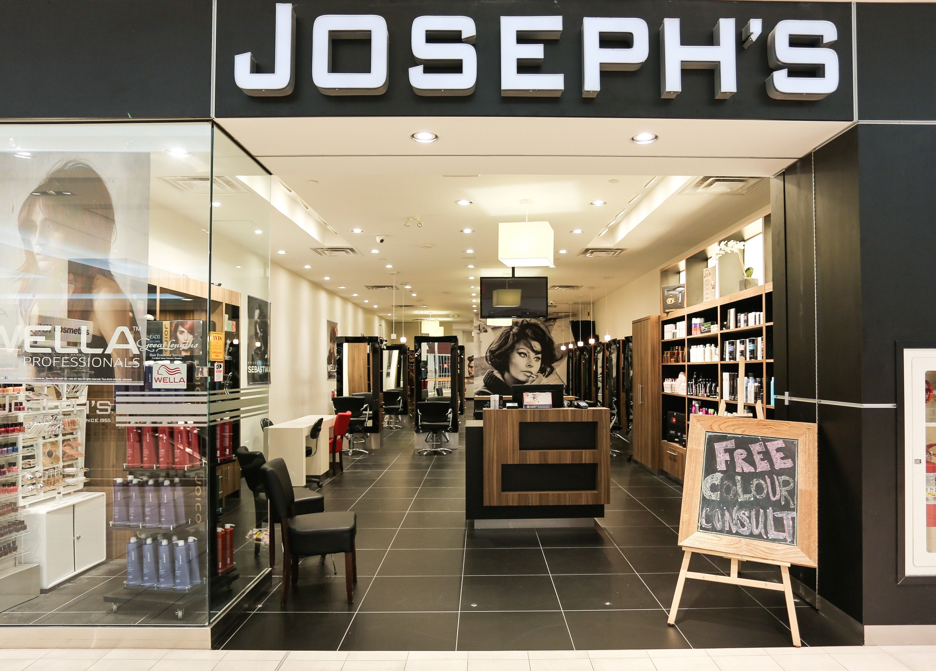 Stylish entry of Joseph's Coiffures in Ottawa, Ontario, CA with sleek interior and product displays.