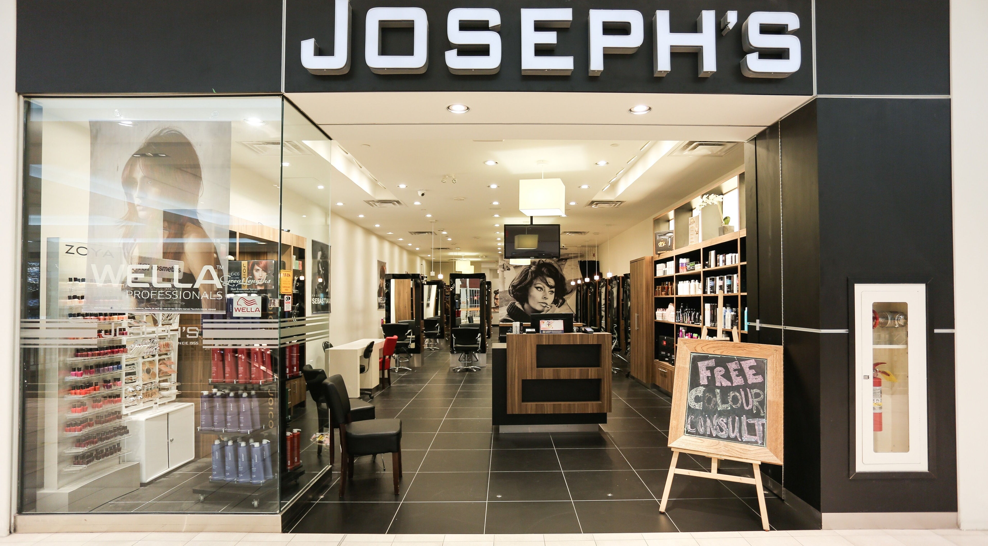 Stylish entry of Joseph's Coiffures in Ottawa, Ontario, CA with sleek interior and product displays.