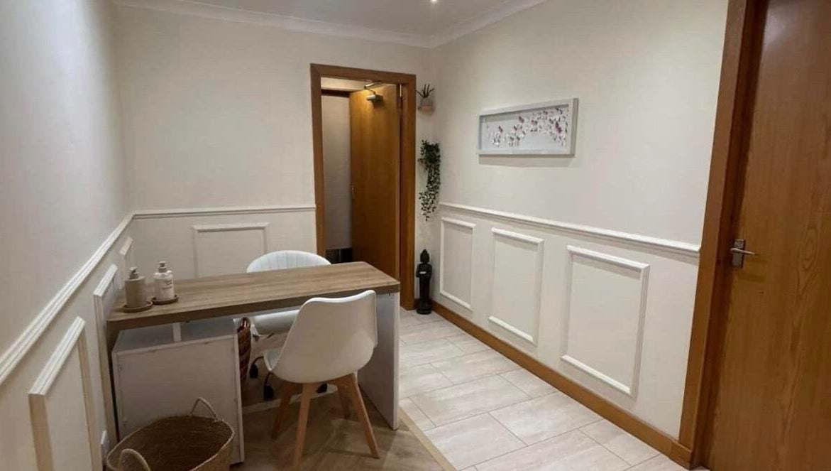 Welcoming entrance of El’Hara Beauty in Prestwick, Scotland, GB, featuring a serene seating area.