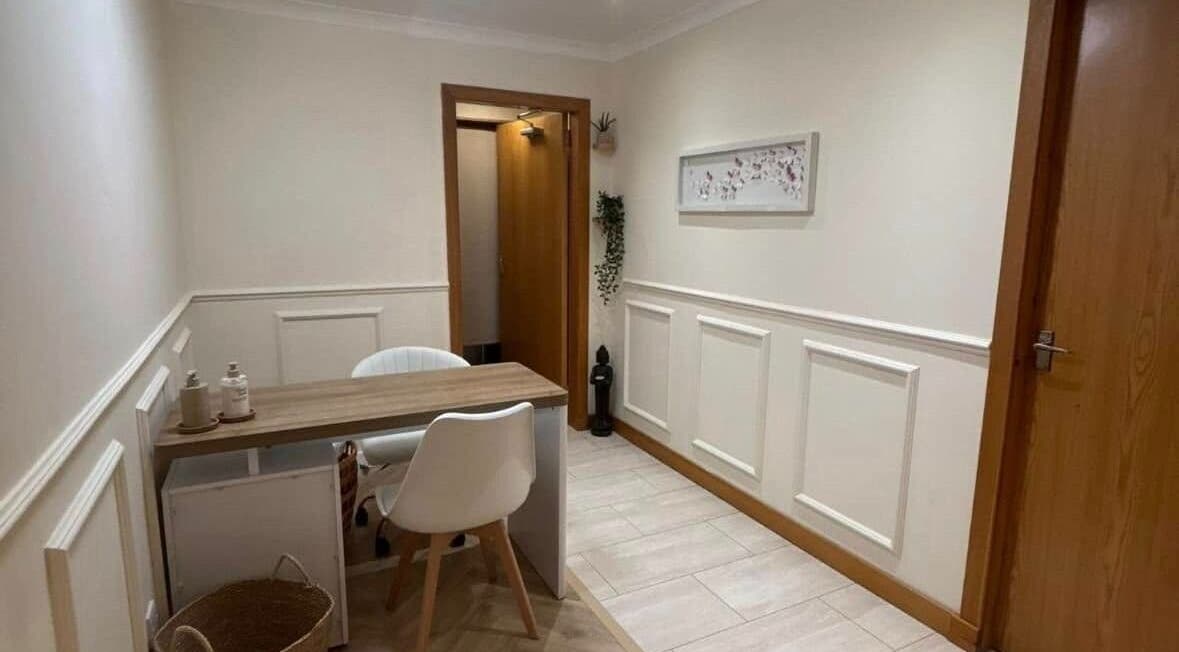 Welcoming entrance of El’Hara Beauty in Prestwick, Scotland, GB, featuring a serene seating area.