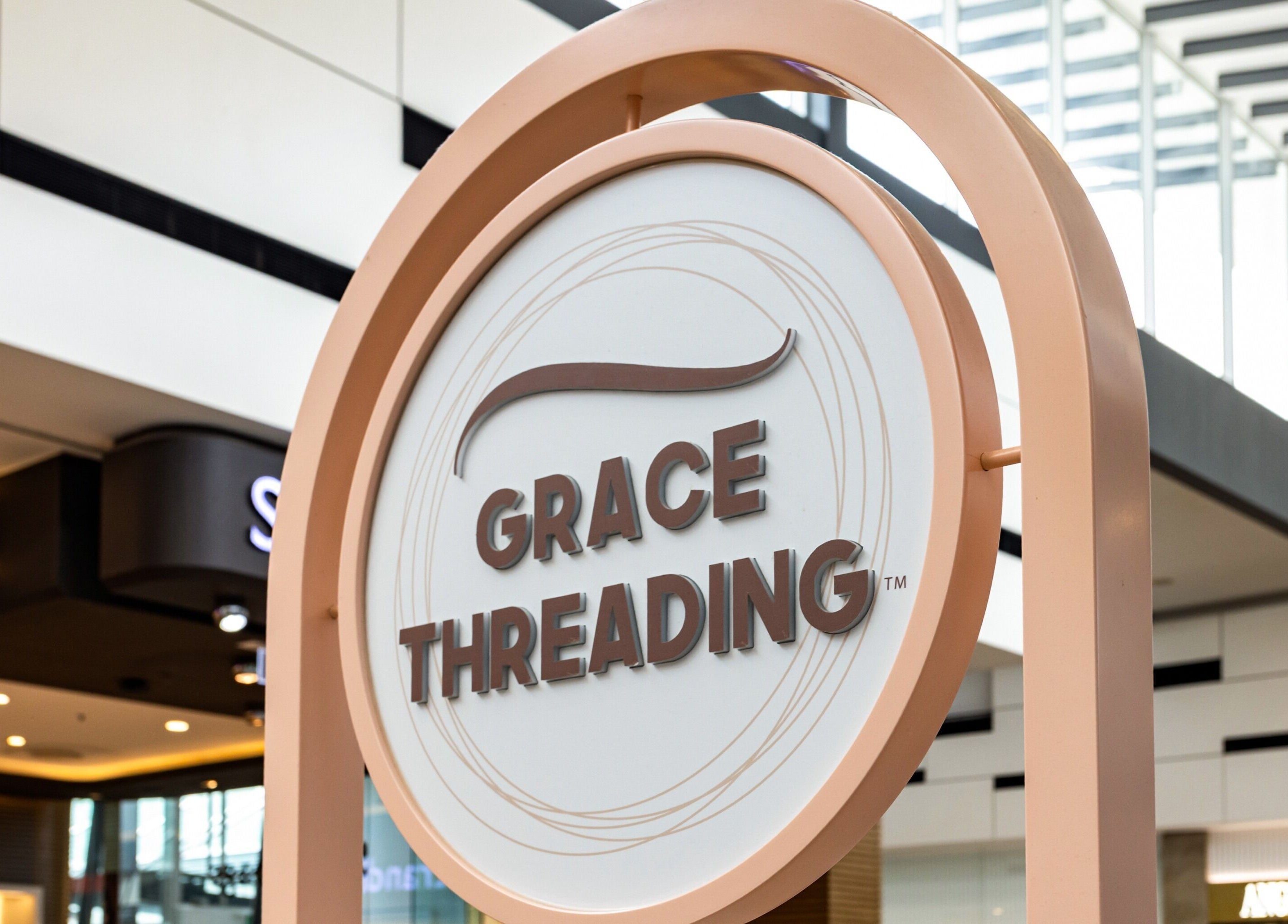 Grace Threading sign at Orion Springfield Central, Springfield Central, Queensland, AU.