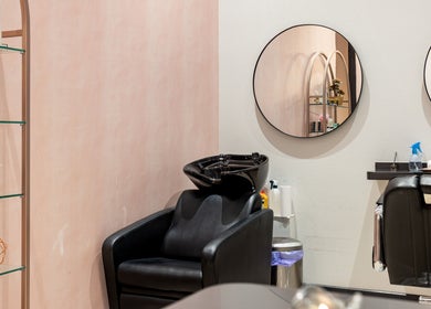 Elegant salon corner at Grace Beauty and Threading - Westfield Coomera, Coomera, Queensland, AU with styling chairs and mirrors.