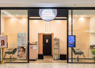 Entrance of Grace Beauty and Threading at Strathpine Centre, Strathpine, Queensland, AU. Elegant salon interior.