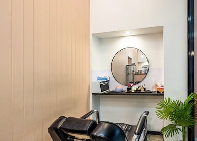 Elegant interior at Grace Beauty and Threading - Strathpine Centre, Strathpine, Queensland, AU with mirror and chair.