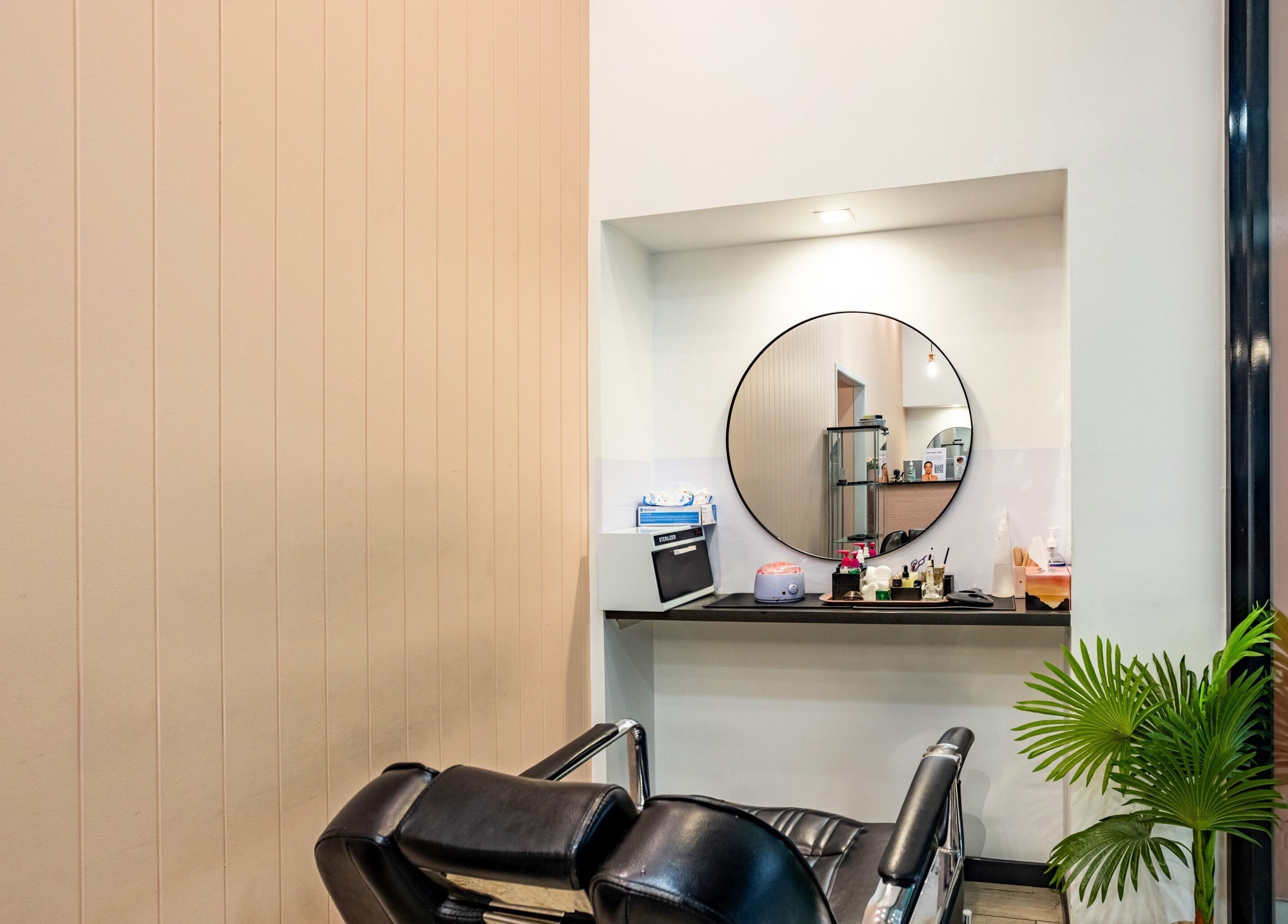 Elegant interior at Grace Beauty and Threading - Strathpine Centre, Strathpine, Queensland, AU with mirror and chair.