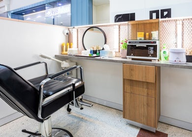 Modern salon station at Grace Threading - Grand Plaza, Browns Plains, Queensland, AU, highlighting sleek design.