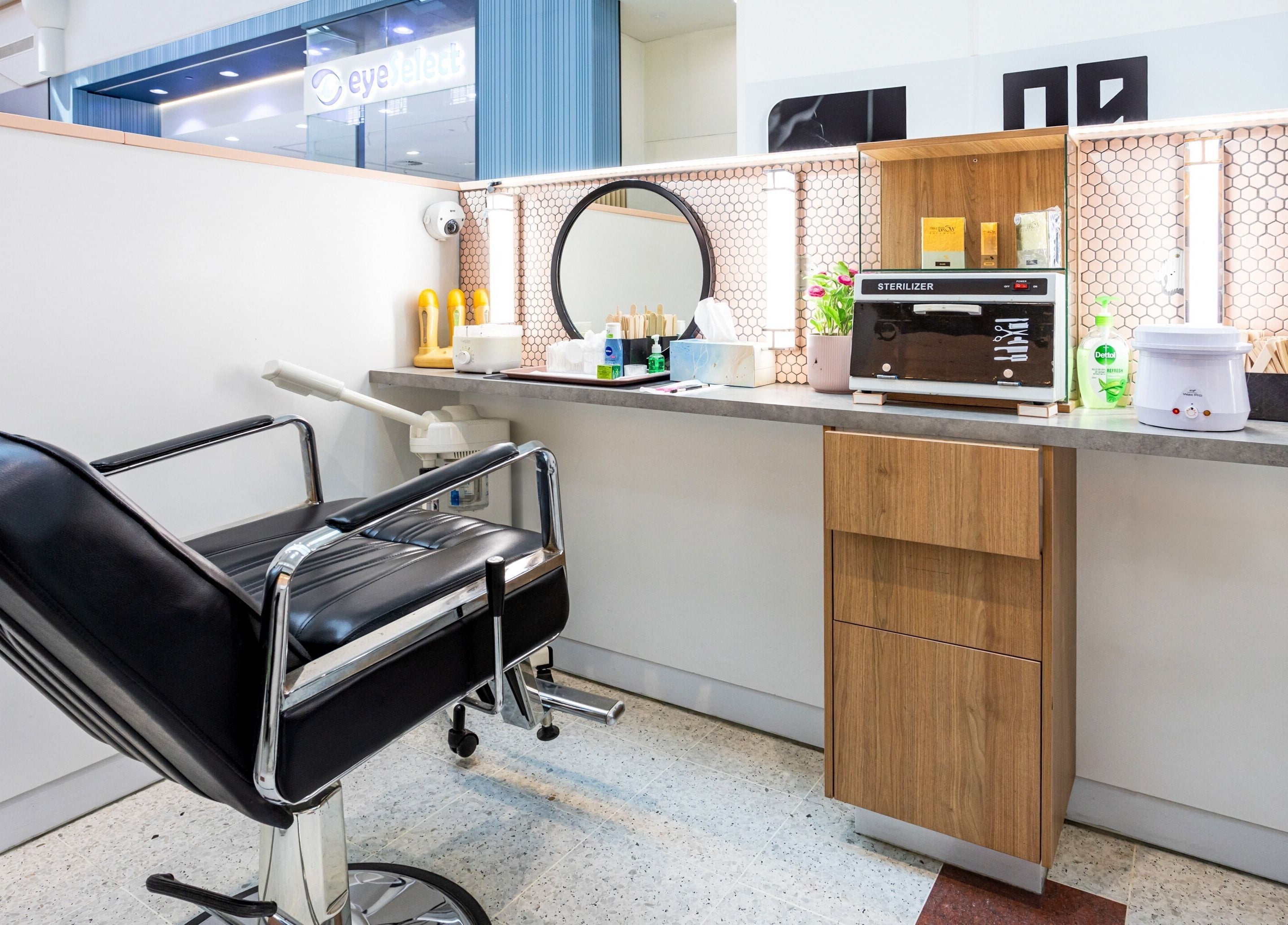 Modern salon station at Grace Threading - Grand Plaza, Browns Plains, Queensland, AU, highlighting sleek design.