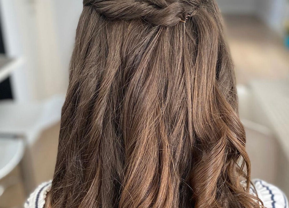 Beautifully styled long brown hair at Sarah’s Unisex Salon, Saint Julian's, MT.