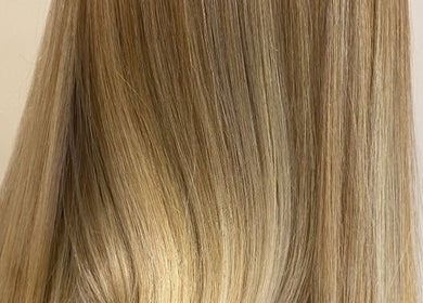 Smooth blonde hair at Eden Hair, David Lloyd Long Ashton, Bristol, England, GB.