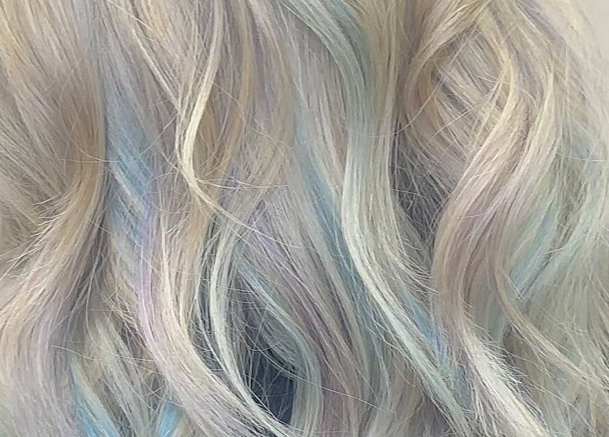 Pastel-colored wavy hairstyle at Eden Hair, David Lloyd Long Ashton, Bristol, England, GB.