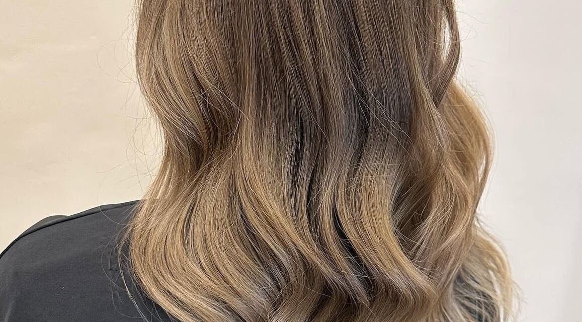 Soft, wavy hairstyle at Eden Hair at David Lloyd Long Ashton, Bristol, England, GB.