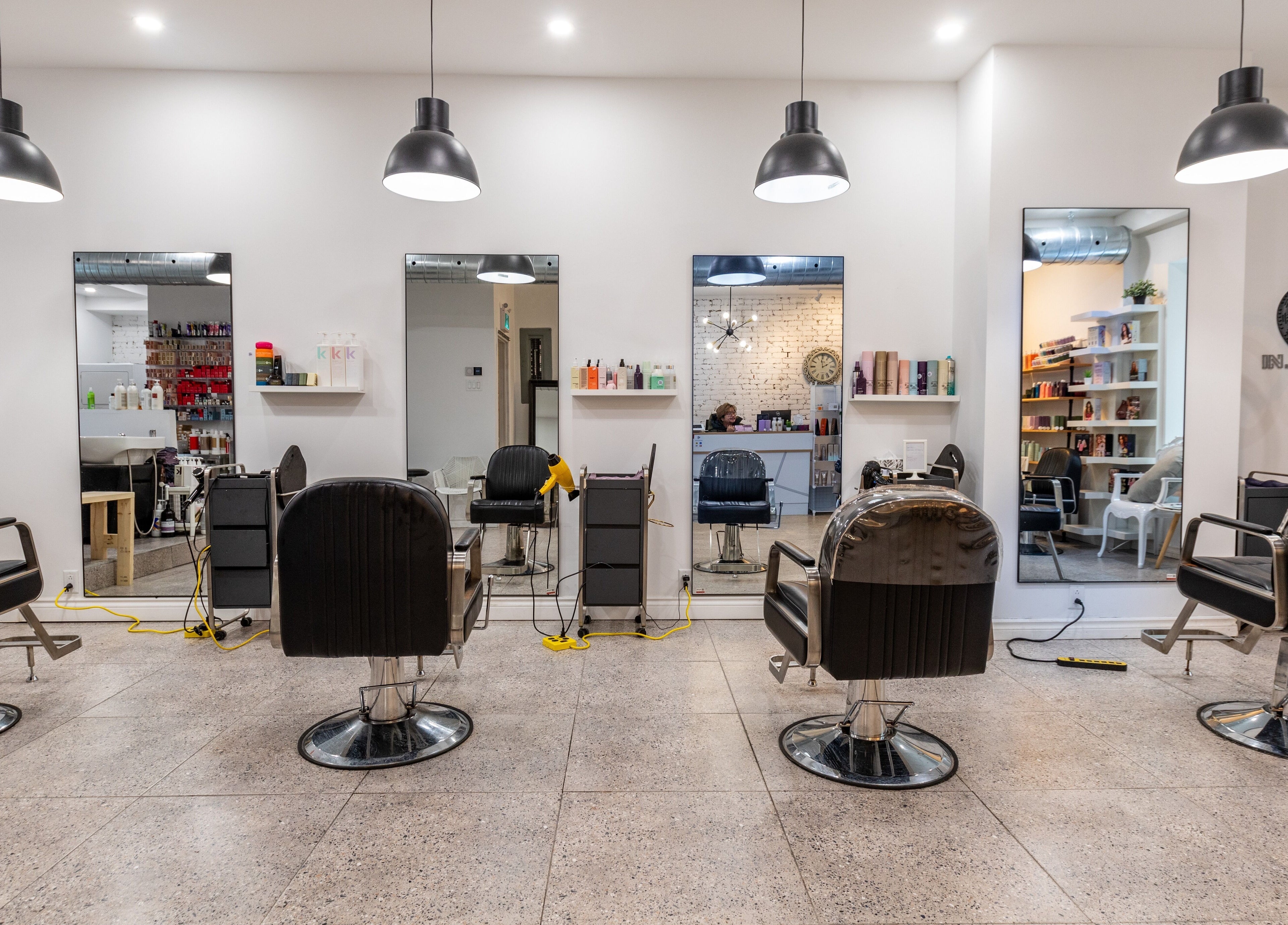 Modern salon chairs and mirrors at IN Salon-Saint-Mathieu (1439 saint-mathieu), Montréal, Québec, CA.