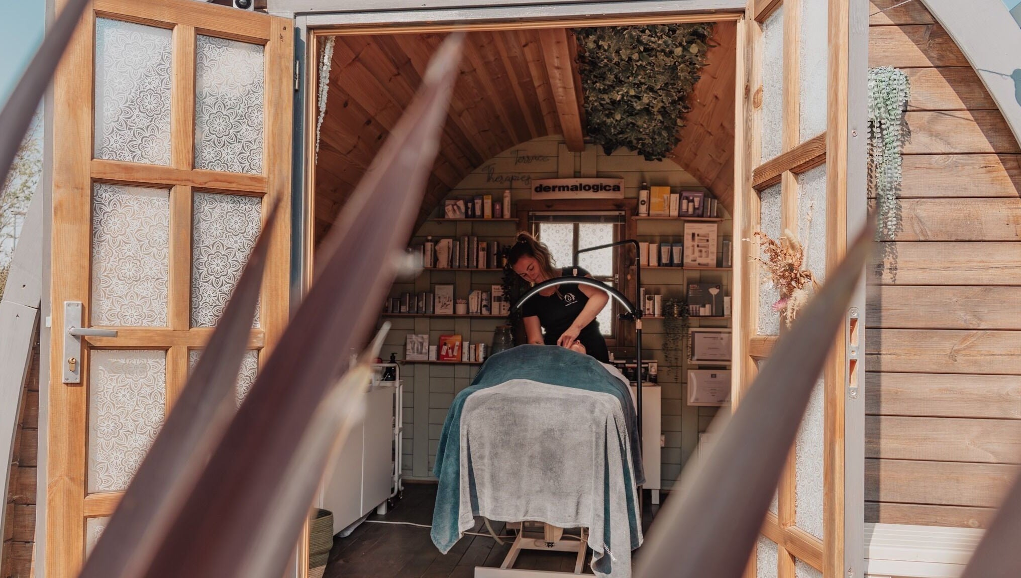 Therapist providing skincare treatment at Bare All Skin in Redruth, England, GB.