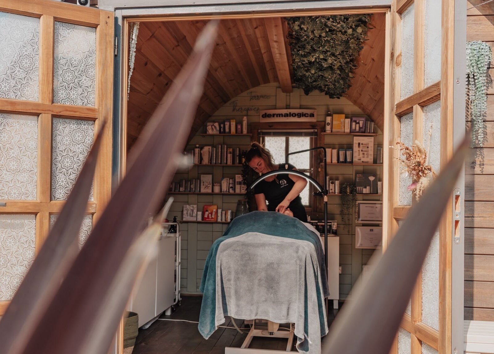 Therapist providing skincare treatment at Bare All Skin in Redruth, England, GB.