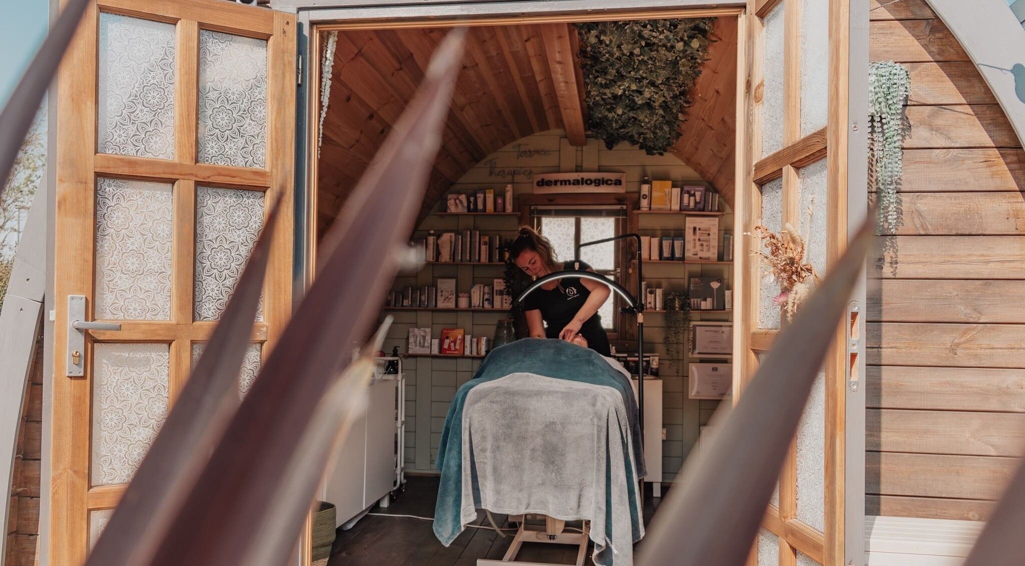 Therapist providing skincare treatment at Bare All Skin in Redruth, England, GB.