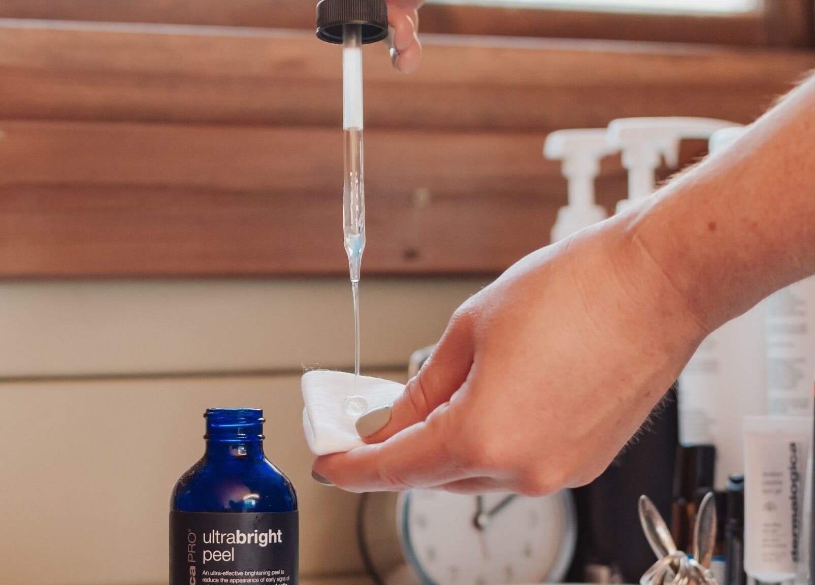 Skincare serum application at Bare All Skin, Redruth, England, GB. Highlighting premium beauty treatments.