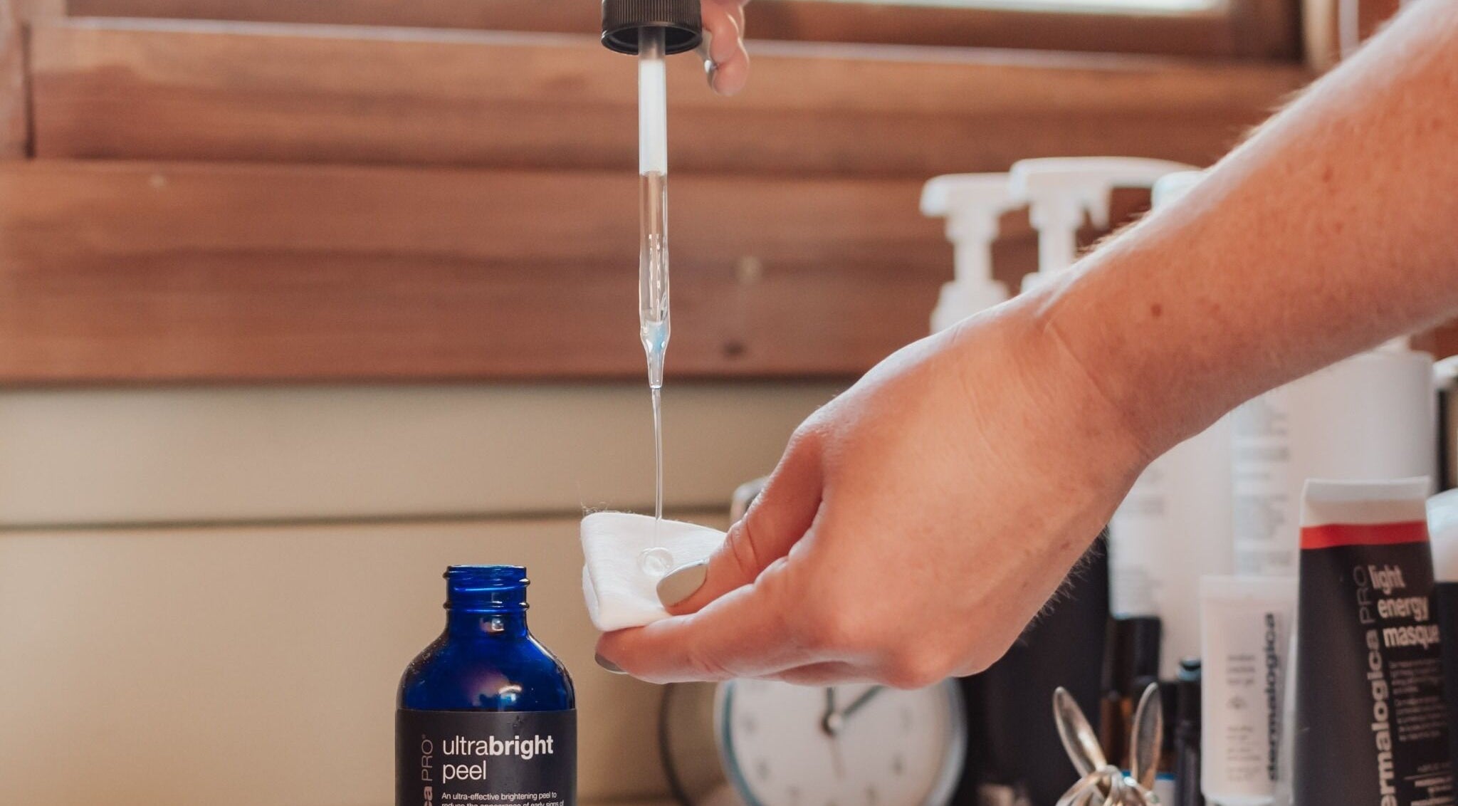 Skincare serum application at Bare All Skin, Redruth, England, GB. Highlighting premium beauty treatments.