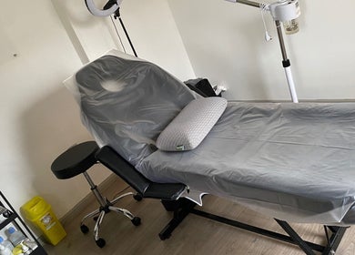 Treatment room at Fitzys Hair and Beauty, Accrington, England, GB, featuring a comfortable treatment bed.