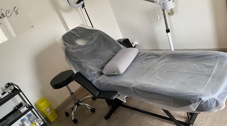Treatment room at Fitzys Hair and Beauty, Accrington, England, GB, featuring a comfortable treatment bed.