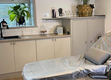 Cozy treatment room at Fitzys Hair and Beauty in Accrington, England, GB with a recliner and modern decor.