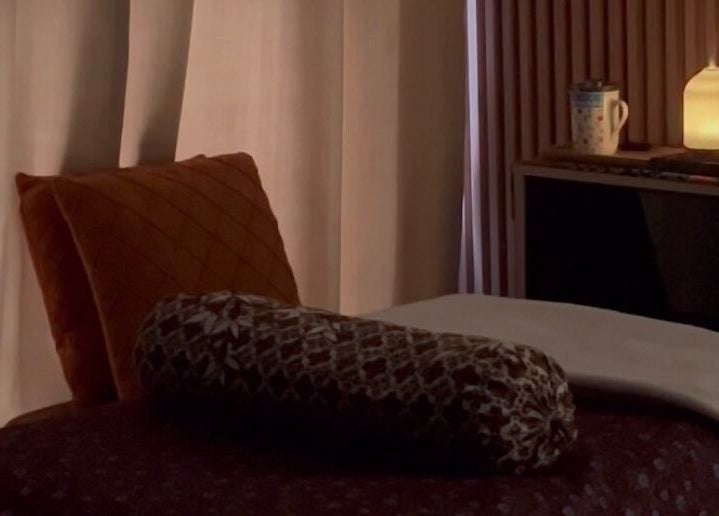 Relaxing massage room at Malaya Harmony Wellness, Kuala Lumpur, Wilayah Persekutuan KL, MY with dim lighting.