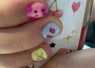 Vibrant, artistic nail design at Mud Beauty in Hook, England, GB, featuring playful and colorful patterns.