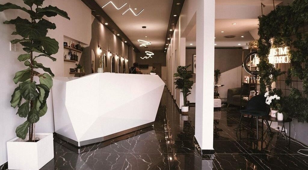 Modern reception area at Enrich - Brazilian Beauty Collective, Rockdale, New South Wales, AU, with sleek decor.
