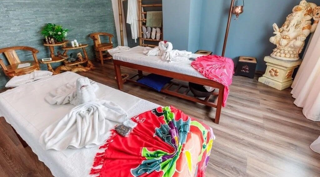 Relaxing massage room at Bali Temple Spa, București, București, RO, featuring massage tables and peaceful decor.