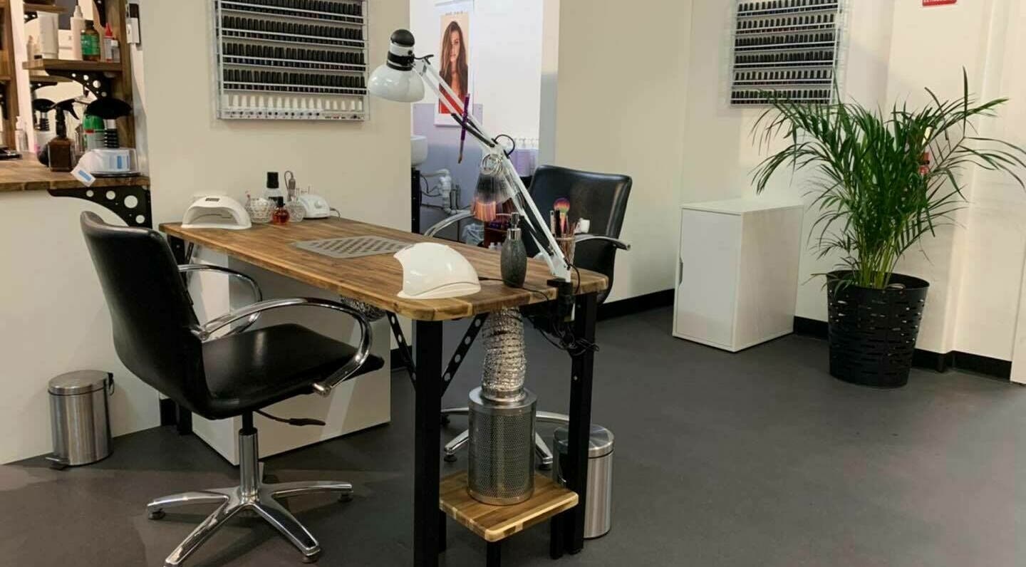 Manicure station at Cutting Crew Australia, Taree, New South Wales, AU with stylish decor and tools.