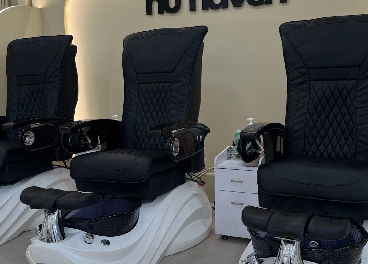 Luxurious pedicure chairs at Nu Haven, London, England, GB offering a refined wellness experience.