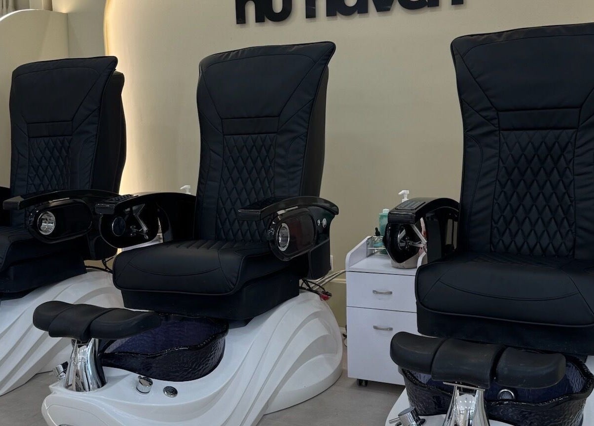 Luxurious pedicure chairs at Nu Haven, London, England, GB offering a refined wellness experience.