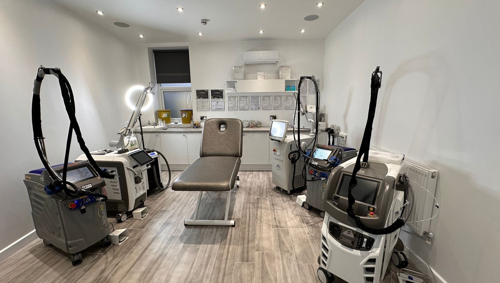 Modern laser treatment room at Harley Skin and Laser, Stoke-on-Trent, England, GB, featuring advanced equipment.