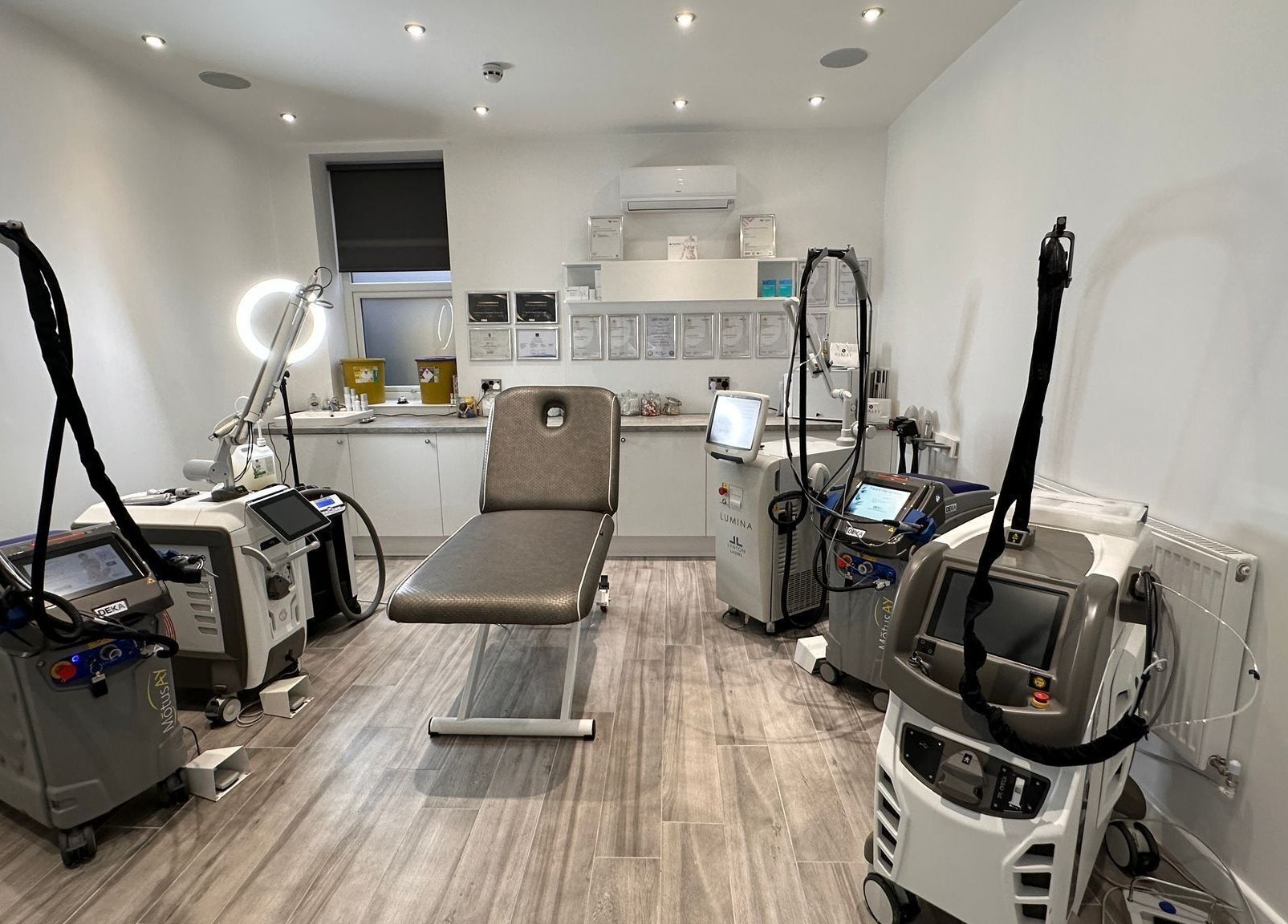 Modern laser treatment room at Harley Skin and Laser, Stoke-on-Trent, England, GB, featuring advanced equipment.