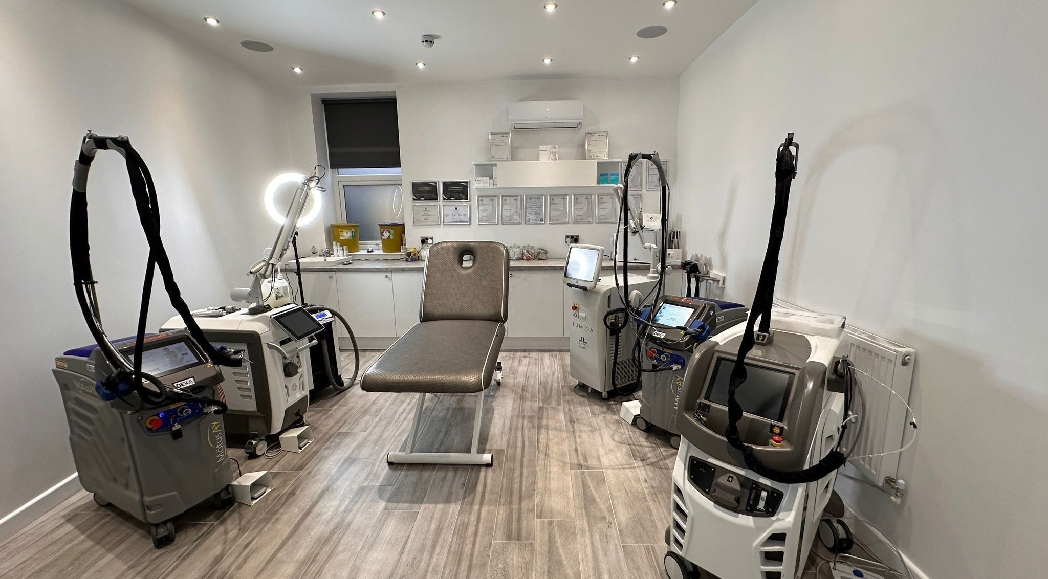 Modern laser treatment room at Harley Skin and Laser, Stoke-on-Trent, England, GB, featuring advanced equipment.