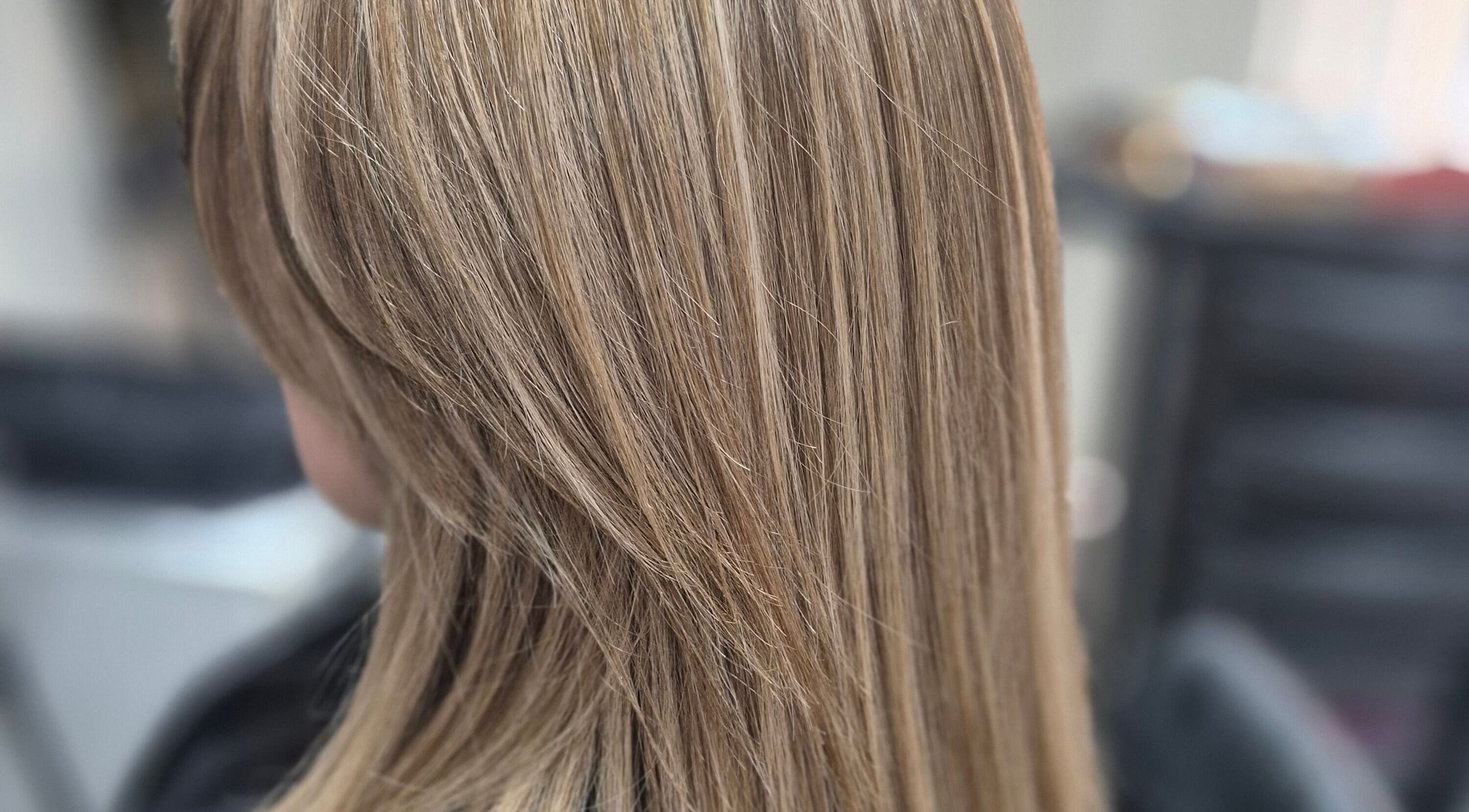 Smooth, blonde highlights at Happy Hair Day in Gungahlin, Australian Capital Territory, AU.