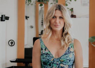 Elegant woman at The Acacia Salon, San Diego, California, US, highlighting glamorous atmosphere.