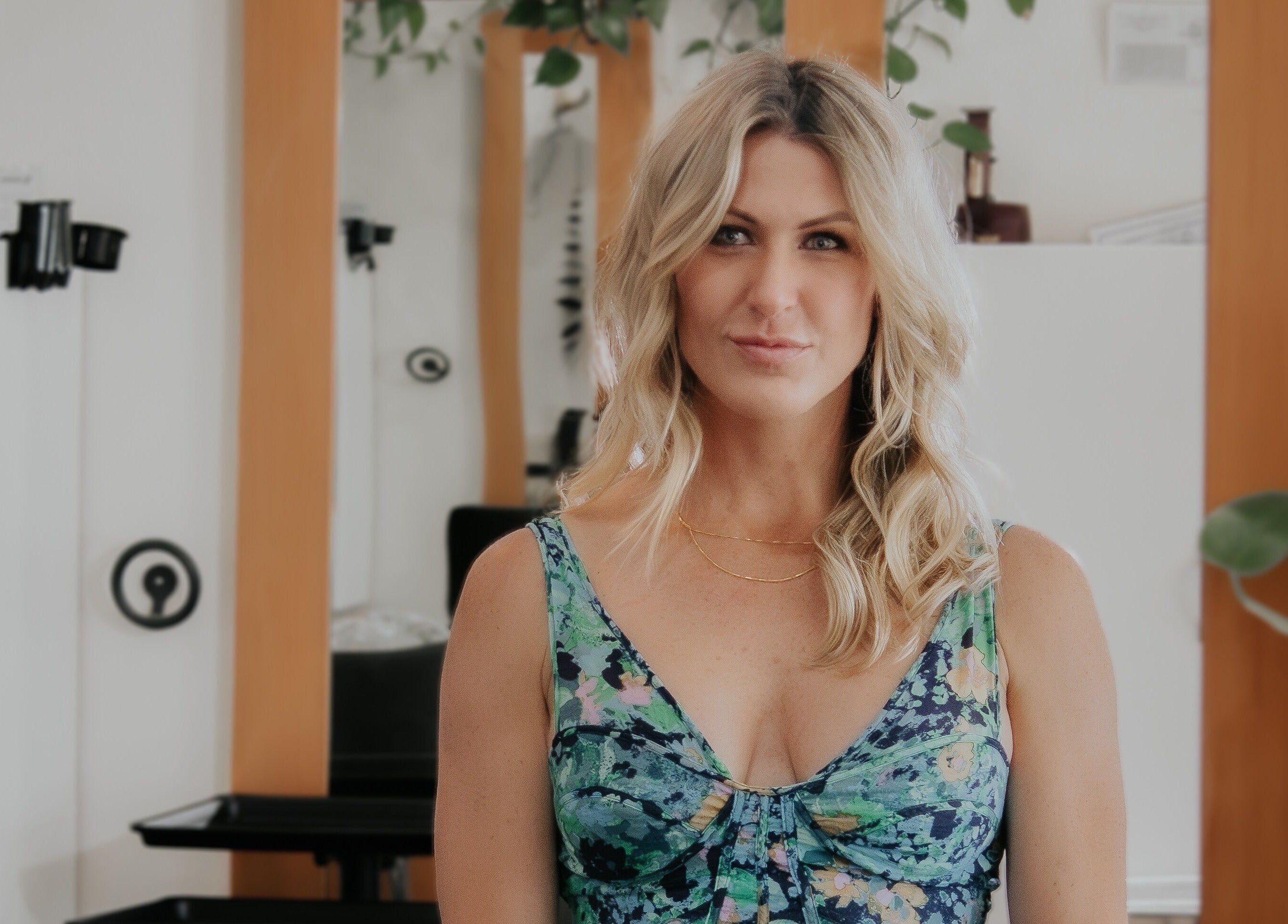 Elegant woman at The Acacia Salon, San Diego, California, US, highlighting glamorous atmosphere.